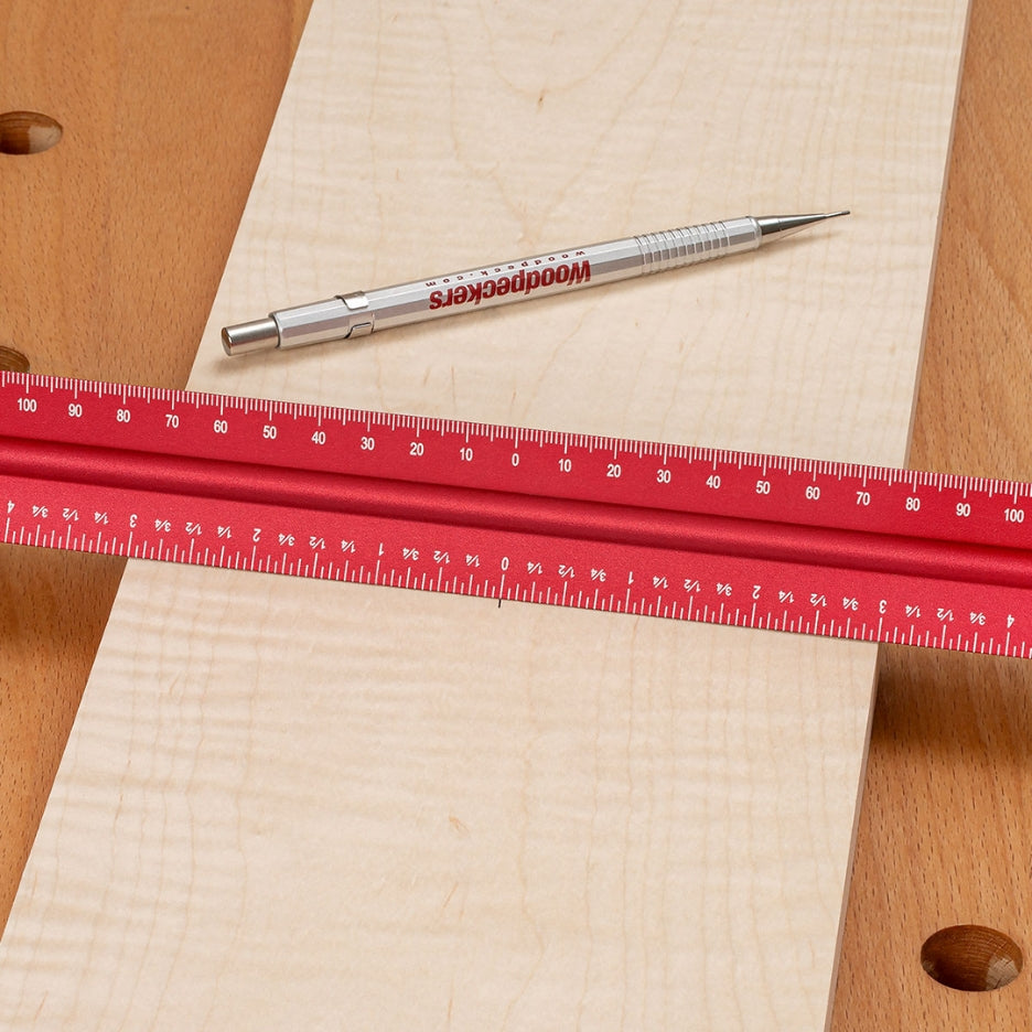 Centering scales in both inch and metric make it simple to locate the middle of material.